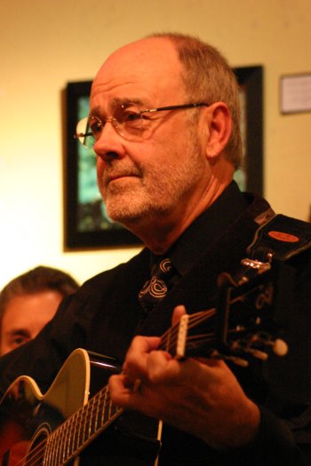 Ant Bee peeking over Jim's guitar 