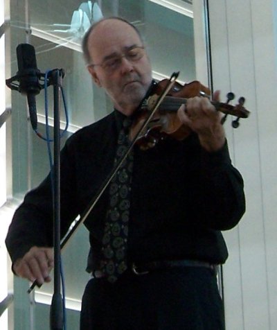 Jim has a light touch on the fiddle